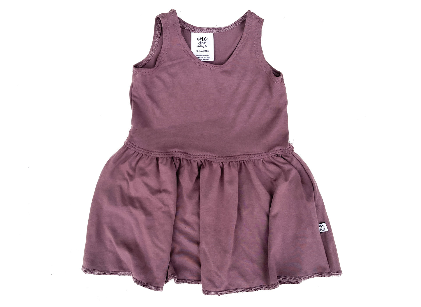 Peplum Dress | Lavender - One Kind Clothing, LLC