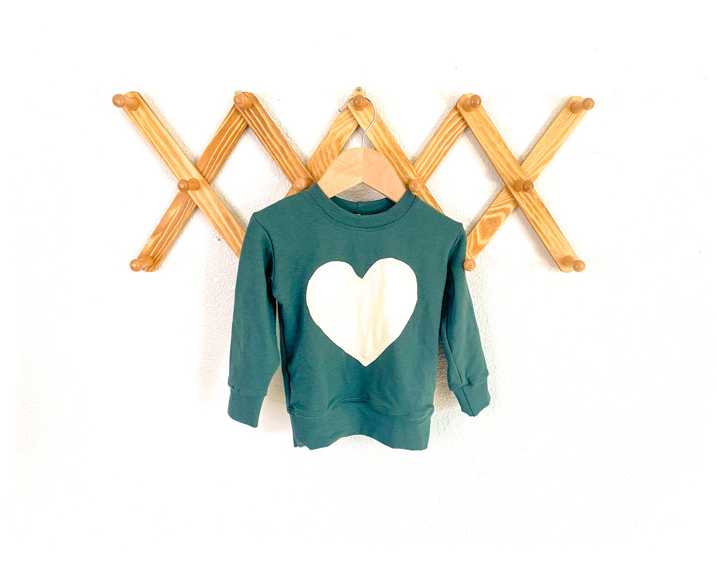 green crew neck sweater